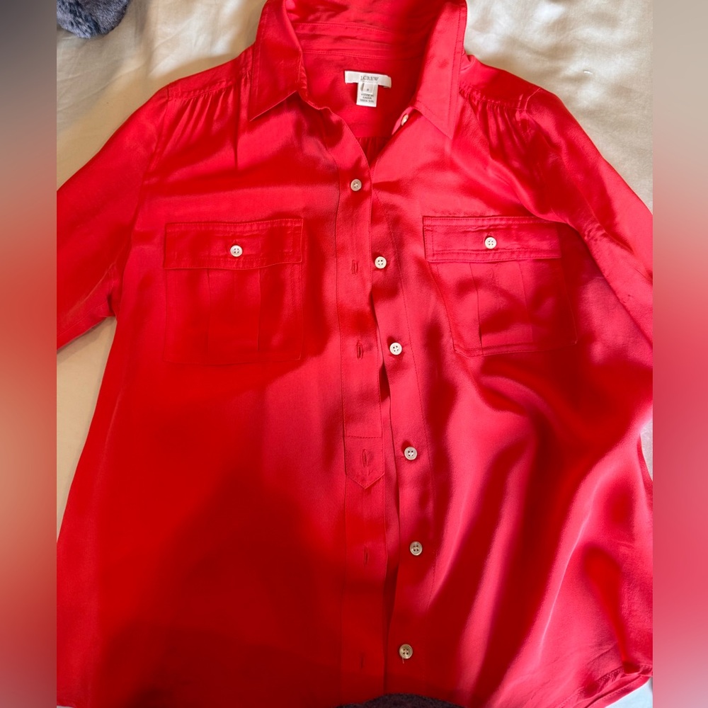 Red hot silk blouse. Get it ladies.